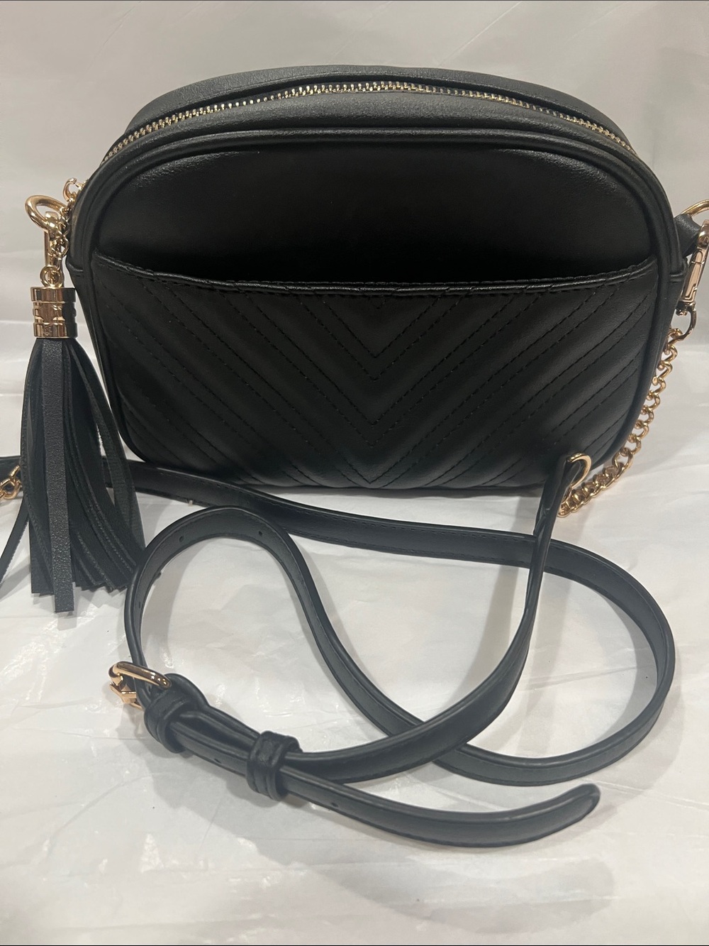 Black Quilted Crossbody Bag with Gold Chain and Tassel